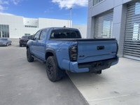 AMVIC Licensed Dealer The 2018 Toyota Tacoma TRD Off Road 4x4 Double Cab, finished in Blazing Blue M... (image 5)