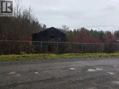 This 5.6 acre property is nestle in a quiet area of town with easy access to downtown and shopping....