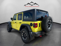 THIS VERY RARE VELOCITY YELLOW WRANGLER RUBICON WITH PLENTY OF OPTIONS INCLUDING 3.6L V6 PENTASTAR E... (image 2)