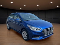 The 2020 Hyundai Accent Essential in an eye-catching blue finish offers a smooth FWD driving experie... (image 3)
