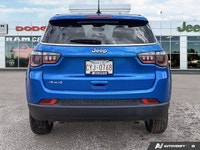 This *2025 Jeep Compass Sport* in striking *Laser Blue Pearl* delivers the perfect balance of capabi... (image 3)
