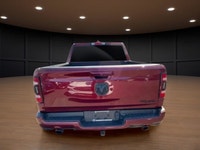 Introducing the stunning red 2023 Ram 1500 Sport 4x4 Crew Cab 5'7" Box, designed to handle the road... (image 6)
