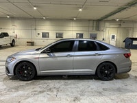 Meet the 2021 Volkswagen Jetta GLI, a sporty sedan that blends everyday comfort with turbocharged fu... (image 9)