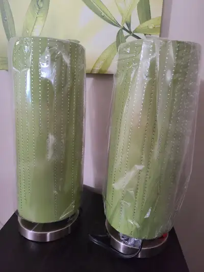 Brand New Table lamps 2 set for $45.00new never uwed. Excellent for gift.Please txt or email only 40...