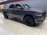 The 2022 Ram 1500 Sport 4x4 Crew Cab in a striking gray exterior is a vehicle crafted for those who... (image 2)
