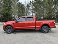 // ACCIDENT FREE!! // // SINGLE OWNER! // Finished in red with a black interior, this 2023 Ford F-15... (image 9)