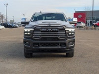 The 2026 Ram 3500 Laramie Crew Cab in Granite Crystal Metallic combines heavy-duty capability with p... (image 9)