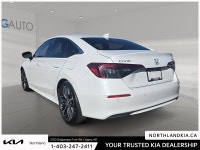 This used 2022 Honda Civic Touring for sale in Calgary has just 82946 km and is finished in Platinum... (image 1)