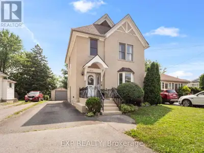 BEAUTIFUL TWO-STOREY, FULL OF CHARACTER! This charming stucco home blends timeless details with thou...