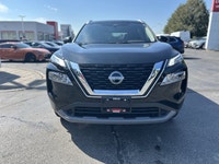 Slide into this sleek 2022 Nissan Rogue SV, boasting a Super Black exterior and a surprisingly spaci... (image 1)