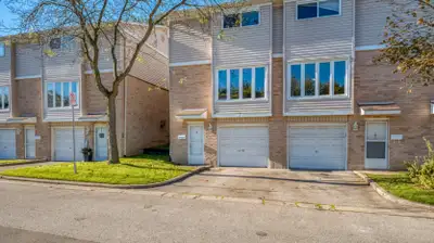 SOUTH CENTRAL THREE BEDROOM CONDO TOWN This quality three level end unit townhome has many upgrades!...