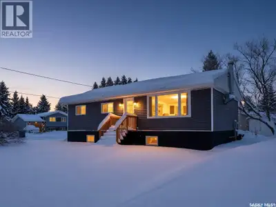 Attention Garage Lovers. Raised 3-bedroom bungalow with great flow and a bright open-concept kitchen...