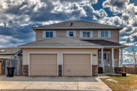 AMAZING 6 BED 6 BATH 2 STOREY HOME ON MASSIVE LOT IN CARSTAIRS!