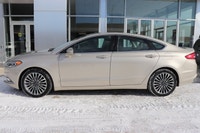 Capital Ford Lincoln Winnipeg Ltd (MB's #1 Rated Ford Store) This WHITE GOLD AWD Fusion Titanium res... (image 2)