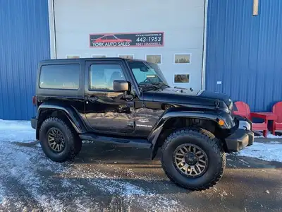 Local nicely equipped 2 Door Jeep Wrangler Sahara 4X4 package in excellent condition with only 120,0...