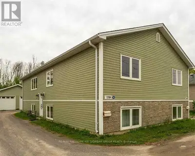 Welcome to the lower-level suite at 179 The Queensway, Keswick! This beautifully maintained and brig...