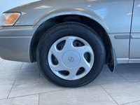 The 1998 Toyota Camry is a fuel-efficient midsize sedan known for its long-lasting durability, smoot... (image 7)
