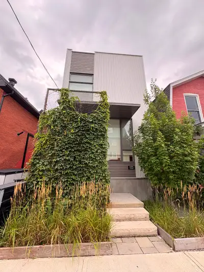 Bright, modern lower-level unit in a newly built quadplex, ideally located within walking distance o...