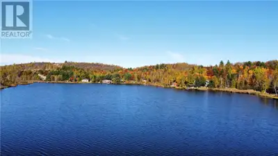 Discover the perfect balance of privacy and convenience on this beautiful lot nestled along the shor...