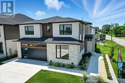 FABULOUS NEW MODEL HOME FOR SALE Located in London's Newer "LIBERTY CROSSING" situated in the COVETE...