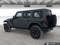 This *2021 Jeep Wrangler 4xe Unlimited Rubicon* combines legendary off-road capability with modern p... (image 3)