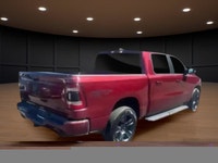 Introducing the stunning red 2023 Ram 1500 Sport 4x4 Crew Cab 5'7" Box, designed to handle the road... (image 5)