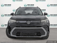 The 2025 Volkswagen Taos Comfortline Black Edition AWD is a striking blend of style and capability w... (image 1)