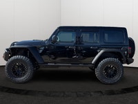 This 2026 JEEP WRANGLER 4-DOOR SAHARA has the following options Cloth Low-Back Bucket Seats, Remote... (image 1)