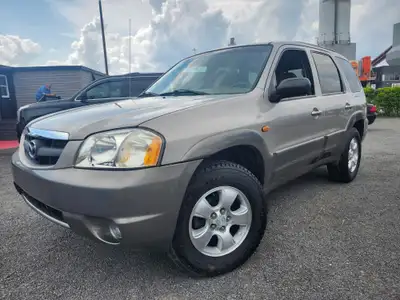 GARANTIE 1 ANS CREDIT DIRECT EN LIGNE AU WWW.AUTO-INTERNET.CA WOW 2001 MAZDA TRIBUTE BAS KM V6 ANTIR...