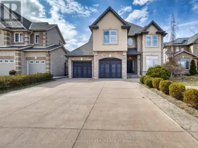 xquisitely crafted custom-built executive home nestled on a quiet court. This stunning 2-story resid...