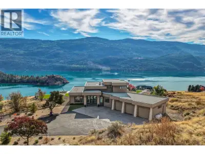Modern lakeview retreat with unrivaled lake, mountain & valley views. Perched above Kalamalka Lake o...
