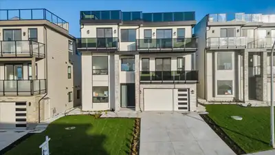 PRICE REDUCED from $1,729,000 to $1,589,000!!!! This beautiful custom built home boasts 6 bedrooms 7...