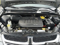 Ready for the road ahead, this 2017 Dodge Grand Caravan Canada Value Package, presented in a sleek B... (image 7)