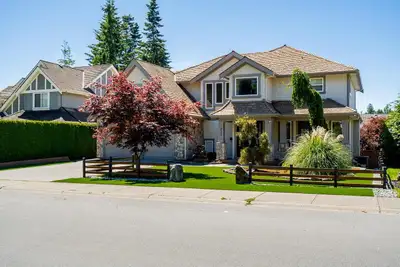 Welcome to this beautifully updated 3-level home offering over 3,750 sq. ft. of living space in a pr...