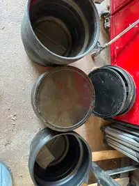 Black bins with lids