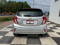 A compact and efficient hatchback with modern convenience features, easy maneuverability, and city-f... (image 4)