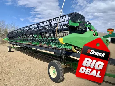 Dual knife drive, Poly tine pickup reel, Crop auger, Horst transport. 2017 John Deere 640FD Brandt d...