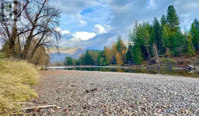 9.37 acres of riverfront land waits for you. Offering convenience and serenity, with a grocery store...
