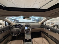 The 2016 MKX Reserve is characterized by its "Split-wing" front grille and a full-width LED taillamp... (image 7)