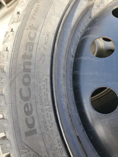 Studded continental 235/45/R18 T XL. Less than one winter of driving (4 months).