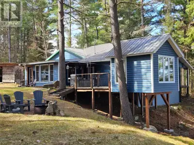 WATERFRONT HOME NESTLED ON THE BEAUTIFUL PRIVATE SHORES OF LAKE TALON. THIS GETAWAY CONSISTS OF AT T...