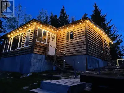 Cozy Lakefront Cabin with the best views at Cluculz Lake. Beautifully decorated and full of charm, t...