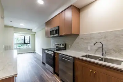 It offers 1+Den & 2 Bedroom apartments designed with a warm palate to create a cozy and inviting spa...