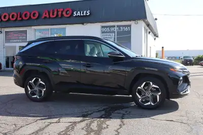 WELL MAINTAINED Luxury Redefined: HYUNDAI TUCSON HYBRID AWD. This SUV Redefines Driving with Its Pow...