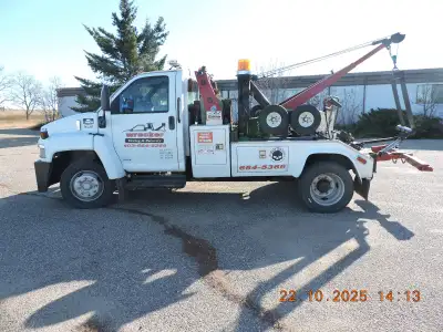 2004 Chev tow truck wrecker with added Holmes 440 rebuilt and works like new. New Inspection Sticker...