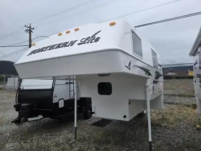 Northern Lite Limited Edition 8-11EXLEDB truck camper highlights: Queen Bed Dry Bath USB Charging St...