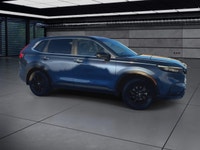 Introducing the stunning 2024 Honda CR-V Hybrid EX-L in a striking Blue finish, designed for optimal... (image 1)