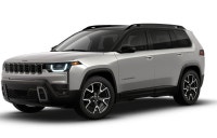 The 2026 Jeep Cherokee Overland, presented in a sleek gray shade and equipped with a robust 4x4 driv... (image 2)