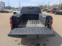 This pre-owned 2024 Ram 1500 Longhorn Crew Cab is finished in striking Patriot Blue Pearl with a pre... (image 5)