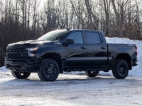 The Chevrolet Silverado 1500 Custom Trail Boss stands tall as a bold and capable off-road-ready pick... (image 2)